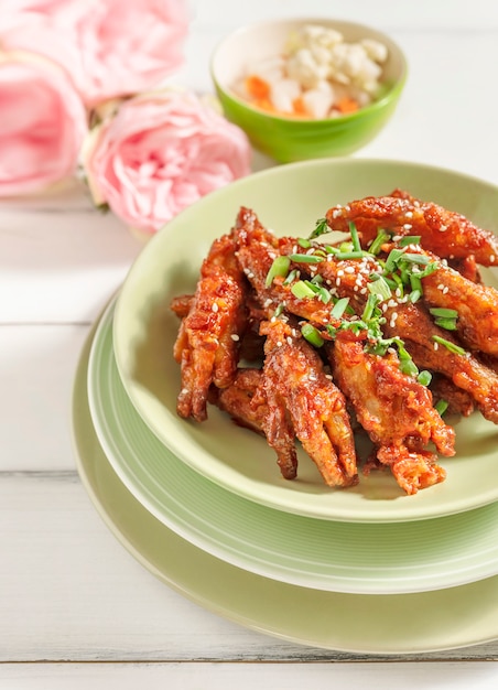 Premium Photo | Crispy fried spicy chicken feet