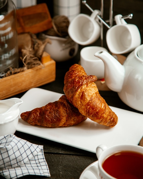 Free Photo | Croissants with cup of tea