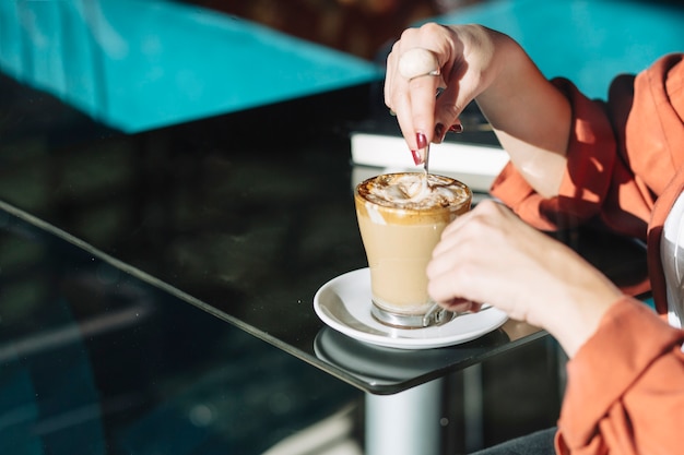 Free Photo Crop Woman Stirring Coffee