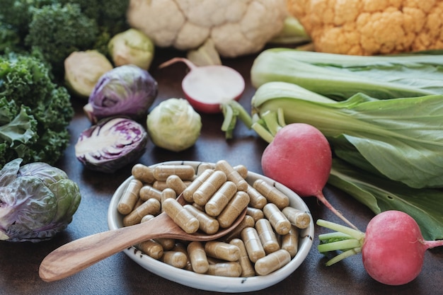 Premium Photo | Cruciferous vegetables capsules, dietary supplements