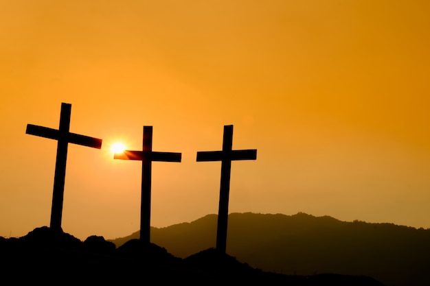 Premium Photo | Crucifixion of jesus christ at sunrise - silhouette ...