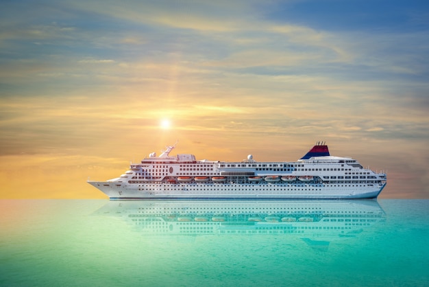 Premium Photo | Cruise ship, ferry sailing in the bright sunset