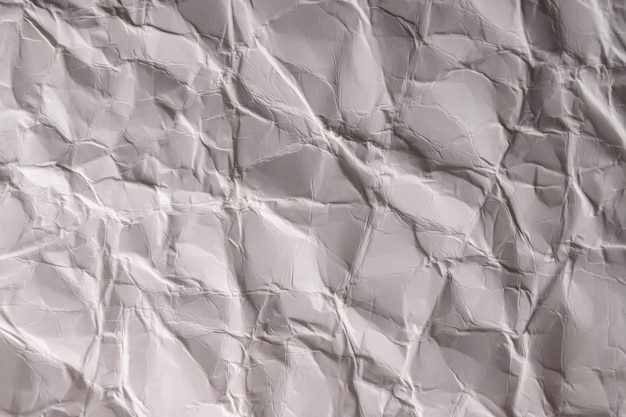 しわくちゃの紙 灰白色の紙のシート 詳細な高解像度テクスチャ 壁紙の抽象的な背景 プレミアム写真