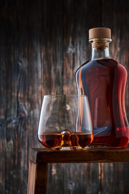 Premium Photo Crystal Glass And Bottle With Whiskey