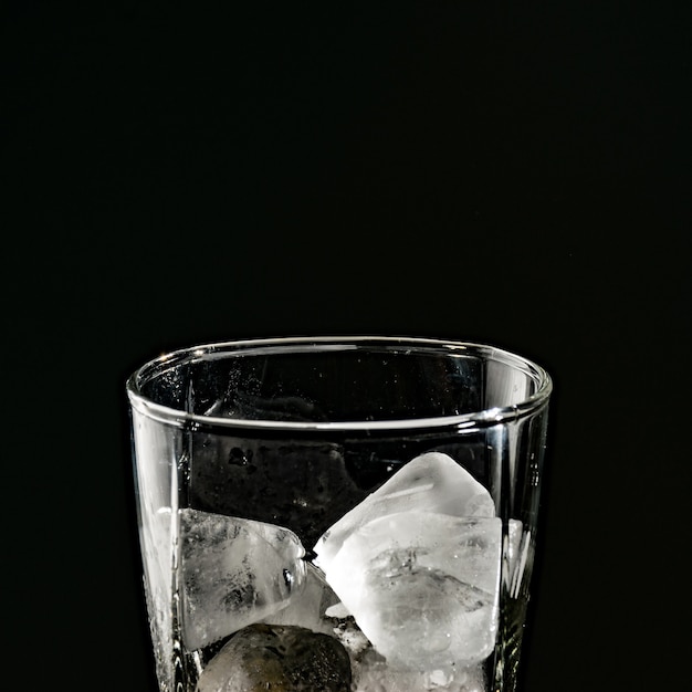 Premium Photo | Crystal glass witch ice cubes