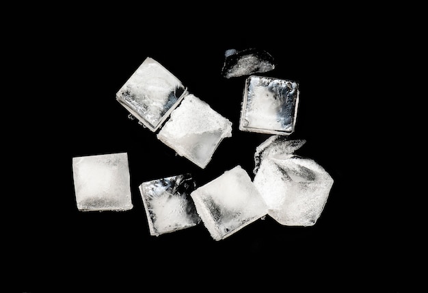 Premium Photo | Cubes of ice isolated on black