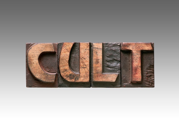 premium-photo-cult-word-assembled-from-vintage-wooden-typography-letters-isolated-on-gradient