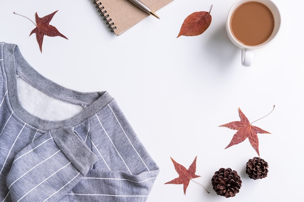 Premium Photo | Cup of coffee with dried autumn leaves and sweater, top ...