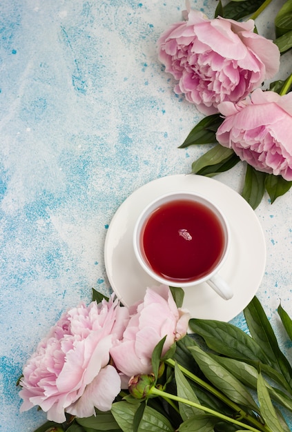 Premium Photo Cup Of Tea And Pink Peonies Flowers 