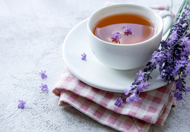 Premium Photo | Cup with lavender tea and fresh lavender flowers