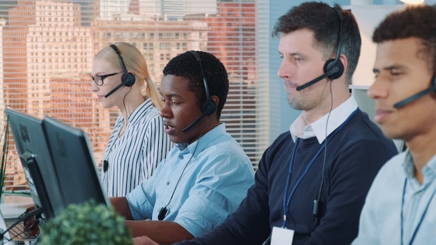 Premium Photo | Customer serviceteam workingin a modern call center