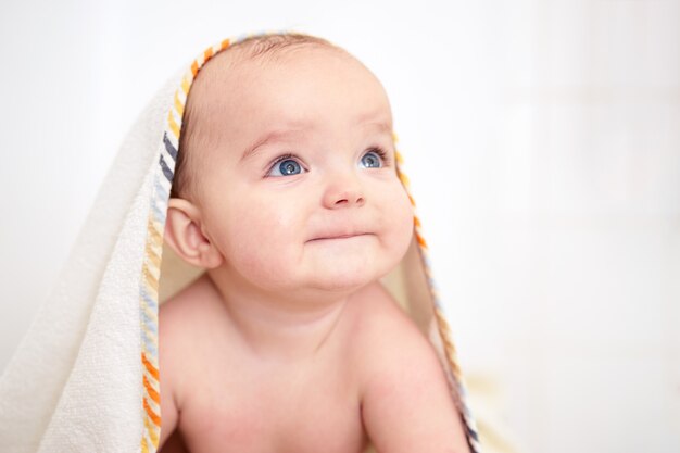 Premium Photo | Cute baby boy sitting after bathing