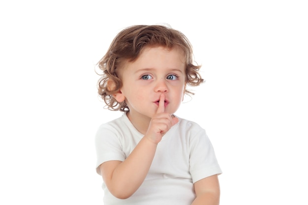 cute-baby-has-put-forefinger-to-lips-as-sign-of-silence_58409-1753.jpg