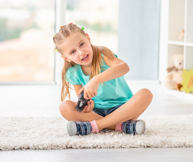 girl and boy playing video games