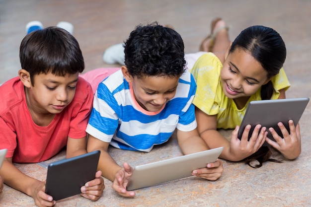 Premium Photo | Cute Children Using Digital Tablets