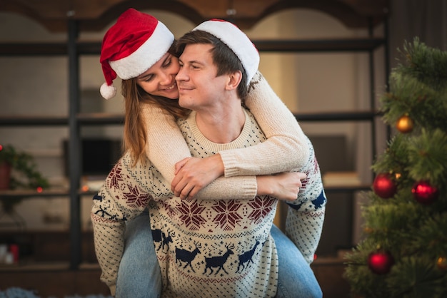 Free Photo | Cute christmas couple being playful