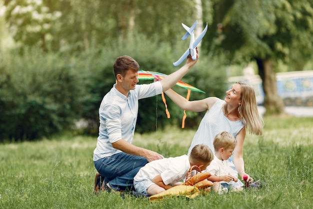 Free Photo | Cute family playing in a summer field