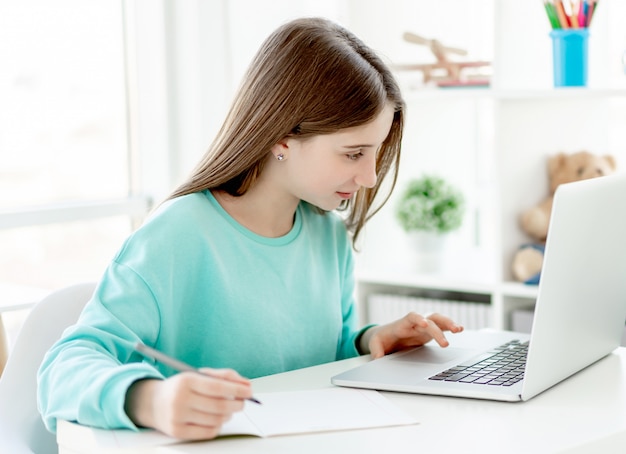 Premium Photo | Cute girl studying with laptop, online education