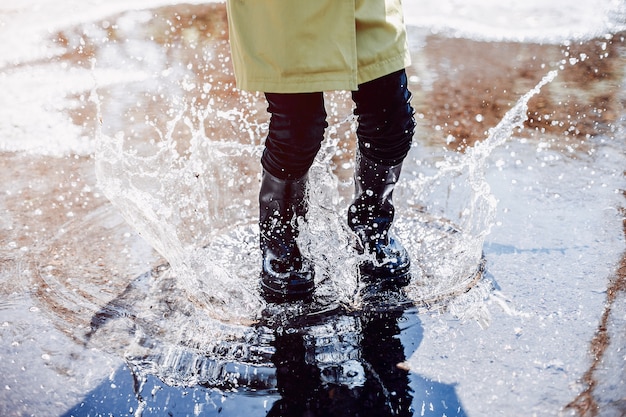 Cute kids plaiyng on a rainy day Free Photo