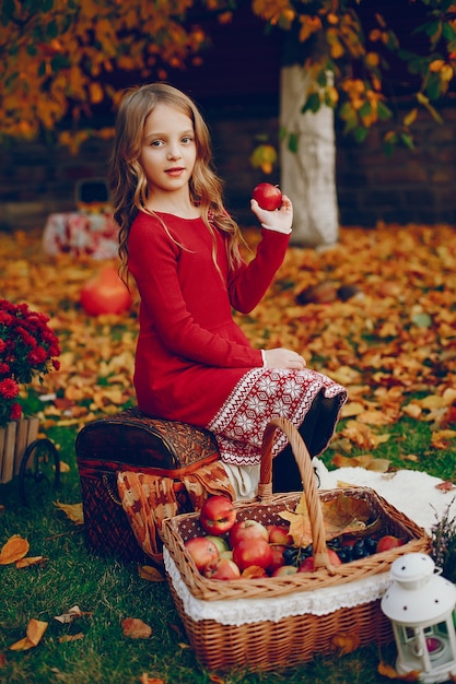 Free Photo | Cute little girl in a autumn park