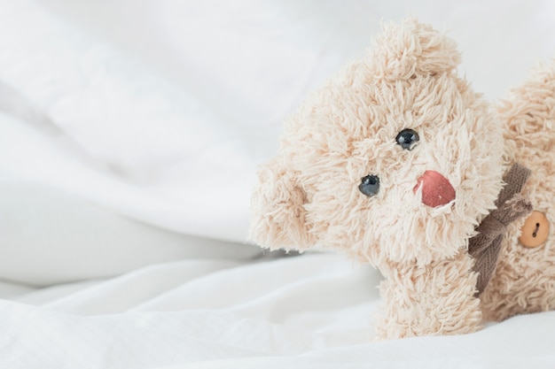 bed full of teddy bears