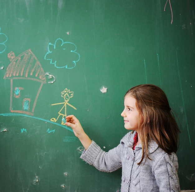 Premium Photo | Cute lovely school children at clasroom having ...