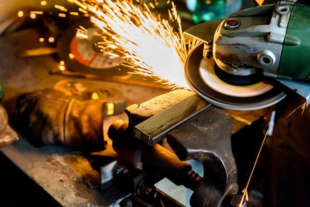 Premium Photo | Cutting metal grinding machine, spark.