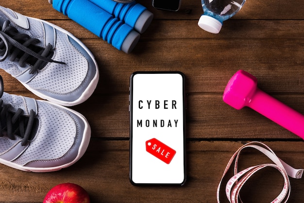 Cyber monday sale with smartphone and shoes