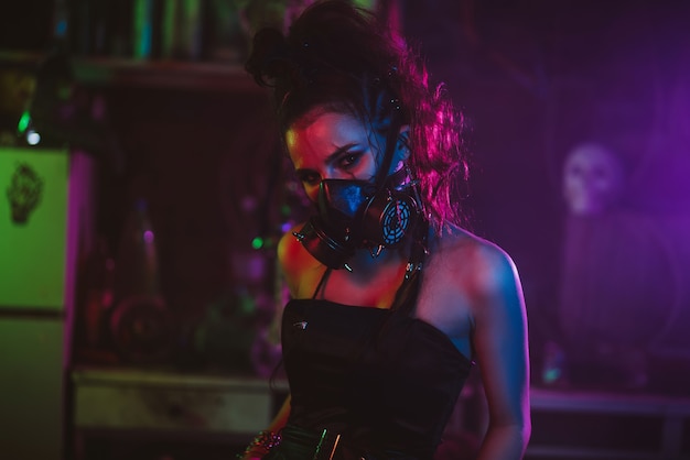 Premium Photo | Cyberpunk cosplay. a girl in a gas mask in a post ...