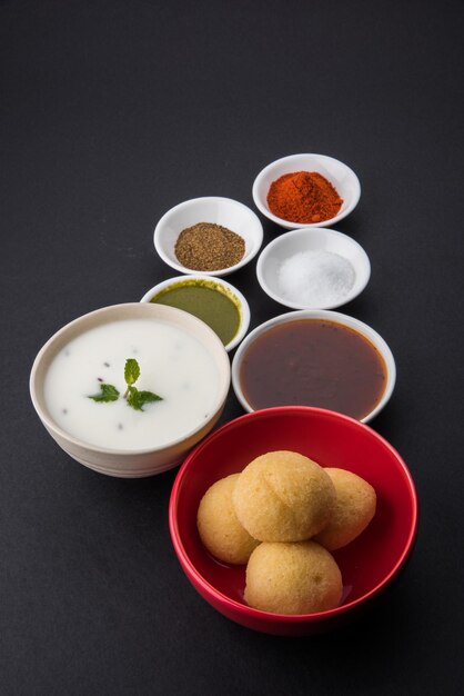 Premium Photo | Dahi vada or dahi bhalla also known as curd vadai in ...