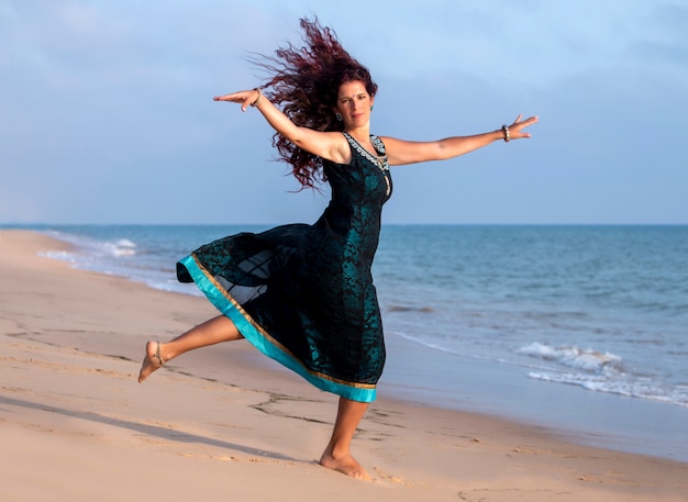 Premium Photo | Dancer on the beach