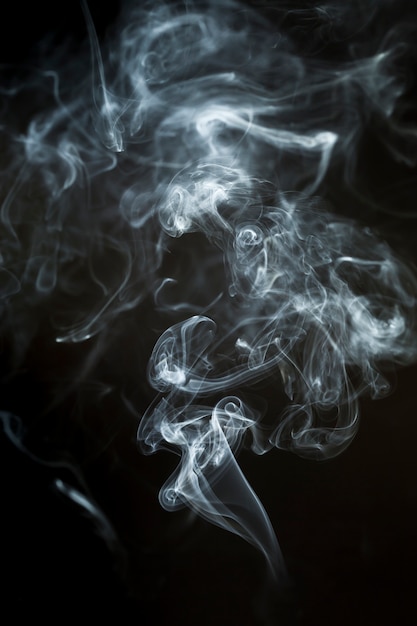 Dark background with dynamic smoke silhouette Photo | Free ...