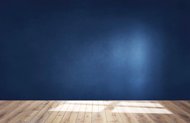 Dark blue wall in an empty room with a wooden floor | Free Photo