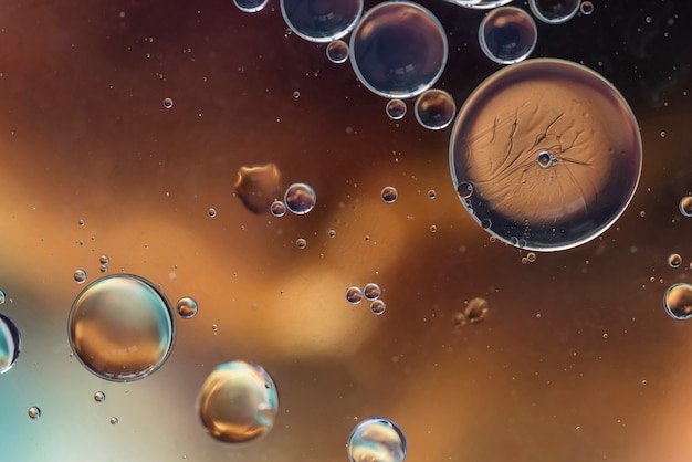 Free Photo | Dark brown abstract background with bubbles