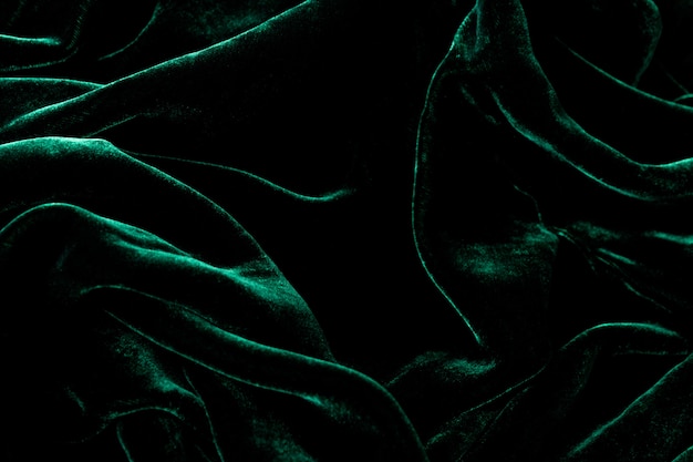 Premium Photo | Dark green velvet background.