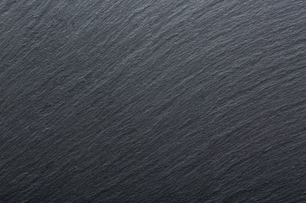 Premium Photo | Dark grey and black slate granite background.