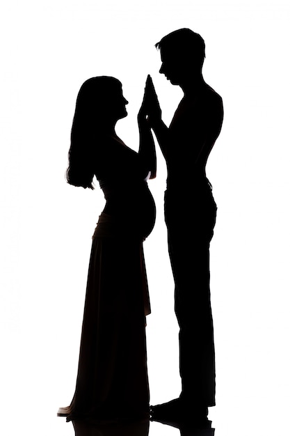 Premium Photo | Dark silhouette of couple isolated on white