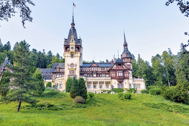 Premium Photo | Daylight side far view to peles castle in romania