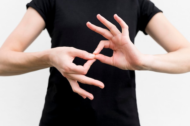 Free Photo | Deaf woman communicating through sign language