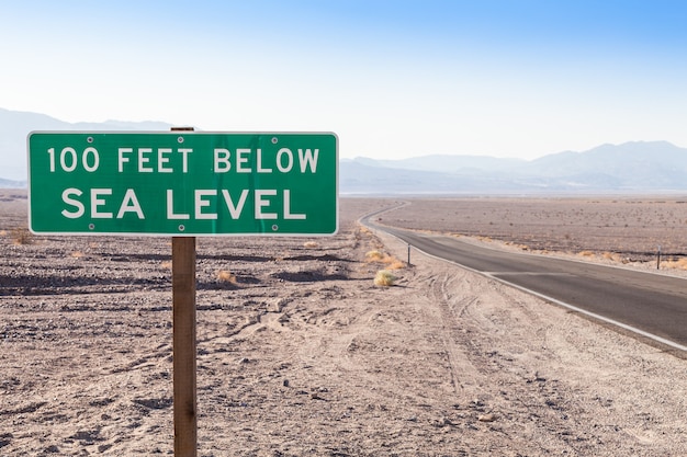 Premium Photo | Death valley, usa. road sight in the middle of the desert