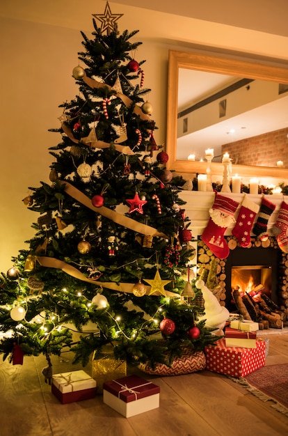 Premium Photo | A decorated christmas tree in the house