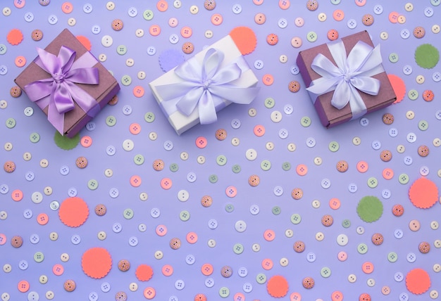 Decorative Background With Colored Buttons In Bulk And Gift Box