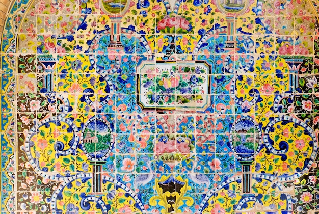 Decorative ceramic tilework on the wall of golestan palace. tehran, iran. Premium Photo
