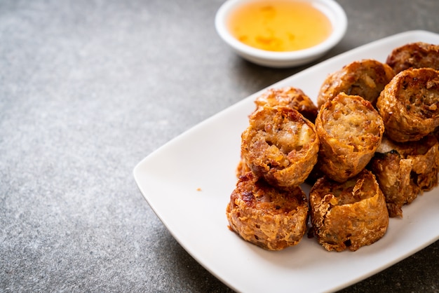 Premium Photo | Deep fried crab roll