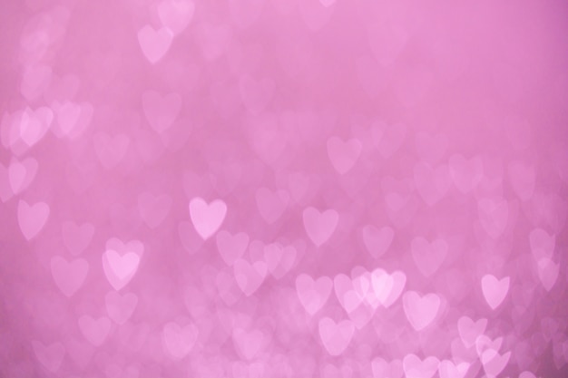 Premium Photo | Defocused lights bokeh background of pink hearts