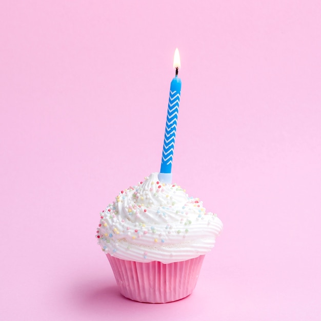 Delicious birthday muffin with blue candle | Free Photo