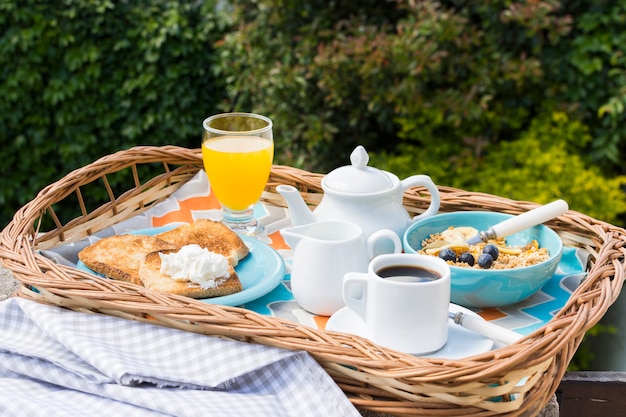 Free Photo | Delicious breakfast tray in the garden