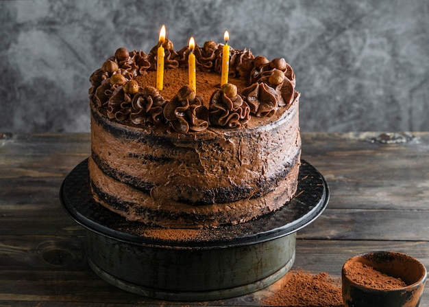 Premium Photo | Delicious chocolate cake with candles