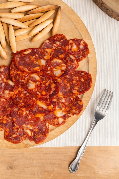 Free Photo | Delicious chorizo sliced on a plate assortment