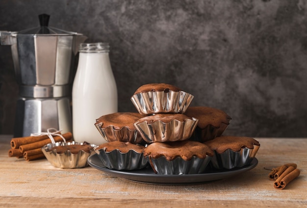 Delicious set of muffins with milk Free Photo